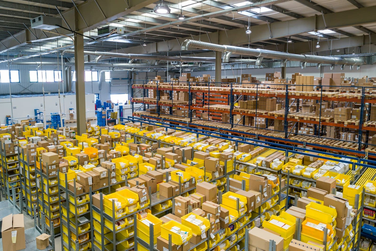 A warehouse floor of racking and pick bins seen from above